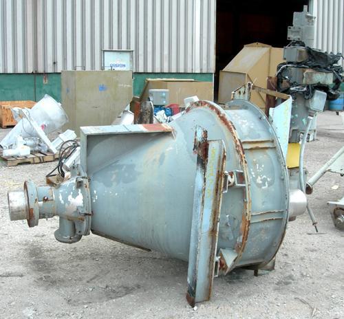 Used Crammer Feeder. 7" diameter feed screw. 48" diameter x 12" straight side x 40" coned 304 stainless steel hopper. Top bolt on cover with openings. Conditioning bar and feed screw driven by a 5 hp...