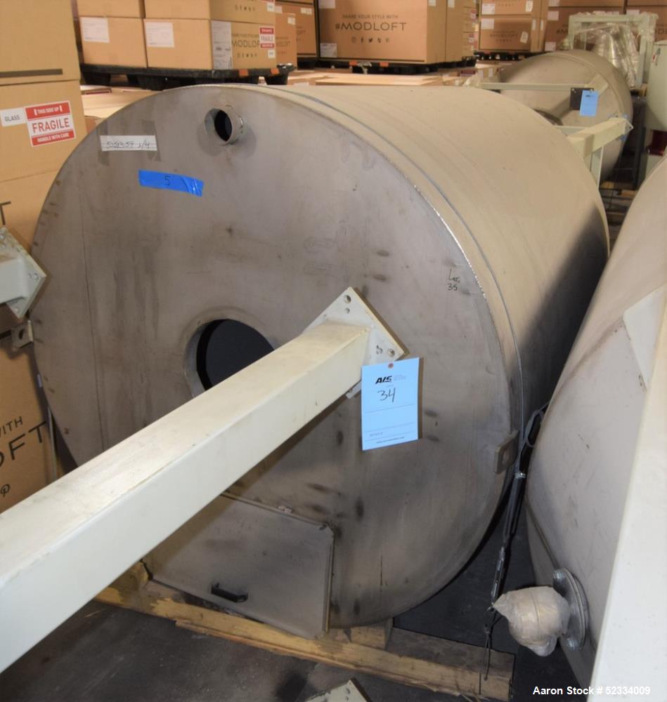 Used Grace-M Plastic Solution Bottom Agitated Stainless Steel Hopper. Approximate 70" diameter x 78" straight side, flat top, bolt on carbon steel flat bottom, approximate overall height 182". Mounte...