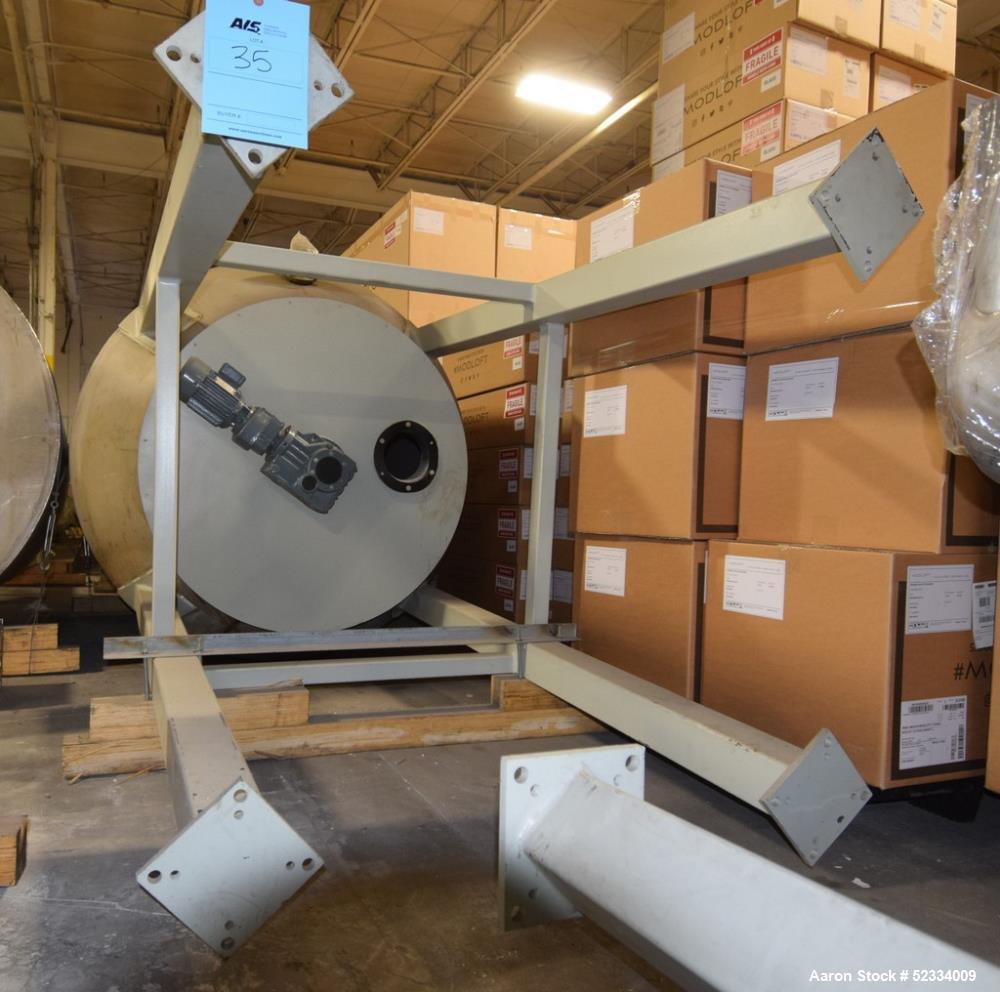 Used Grace-M Plastic Solution Bottom Agitated Stainless Steel Hopper. Approximate 70" diameter x 78" straight side, flat top, bolt on carbon steel flat bottom, approximate overall height 182". Mounte...
