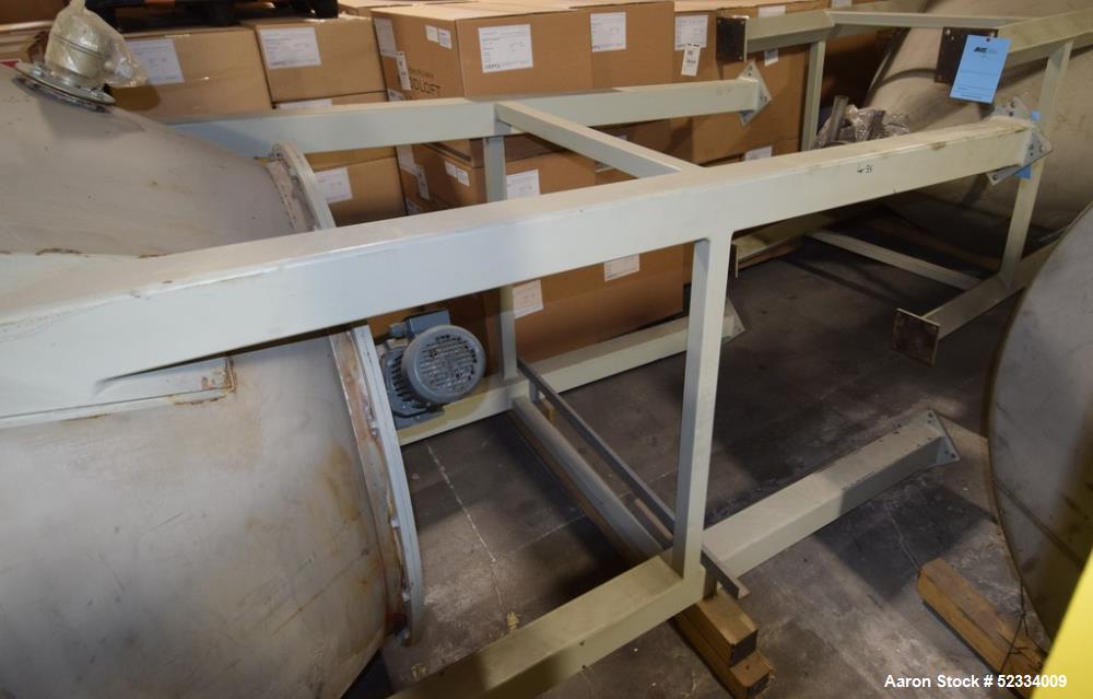 Used-Grace-M Plastic Solution Bottom Agitated Stainless Steel Hopper. Approximate 70" diameter x 78" straight side, flat top...