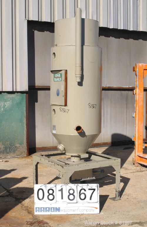 USED: Conair insulated dry hopper, model 1805390300. Approximate 12 cubic foot capacity, carbon steel. 26" diameter x 46" straight side x coned bottom. Side access door. Center bottom outlet. Mounted...