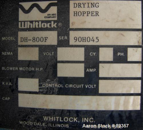 Used Whitlock Insulated Drying Hopper, 800 pound capacity, model DH-800F, carbon steel. Approximately 30" diameter x 48" straight side. Removable top, coned bottom, side access door, center bottom ou...