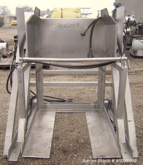 Used Apache Stainless Box Dumper, 304 Stainless Steel. Dump area 42" wide x 49" deep x 54" high. Dual ram, hydraulically driven, no power pack. Approximate 48" dump height. Mounted on a stainless ste...