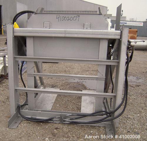 Used- Apache Stainless Box Dumper, 304 Stainless Steel. Dump area 42" wide x 49" deep x 54" high. Dual ram, hydraulically dr...