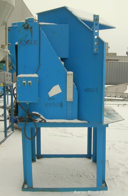 Used Eagle Hydraulic Gaylord Dumper, carbon steel. Approximate 48" x 48" x 48" tall bed. Driven by a 2 hp hydraulic power pack. Mounted on a 39" tall carbon steel stand, approximate 96" dump height.