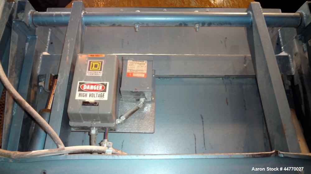 Used NBE National Bulk Equipment Hydraulic Gaylord Box Dumper, Model 21-210, Carbon Steel.  Appproximately 48"wide x 41" deep, 102" dump height. Approximately 3/4 hp motor.  Mounted on 52" tall legs.