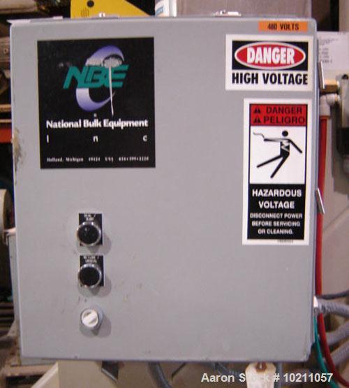 Used NBE Lift and Seal Drum Dumper, Stainless Steel Material Contact Parts, Model 19-700.  750 pound capacity unit. Comes complete with controls and power disconnect interface. Material flow is contr...