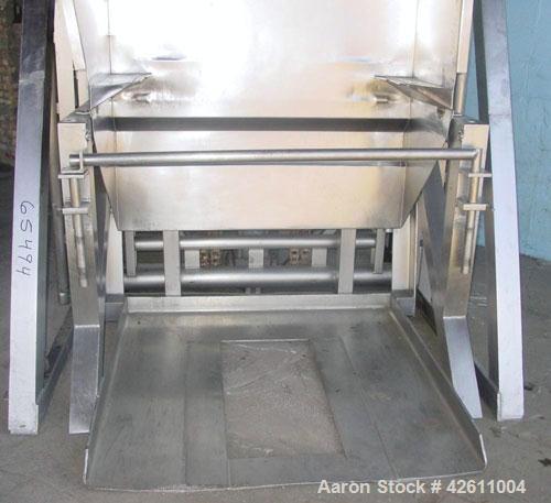 Used RMF Steel Products Hydraulic Box Dumper, model 110, stainless steel. 3,000 Pound capacity. Platform 52" wide X 52" long, maximum tote height 43", dump height approximately 96". Includes a dump c...