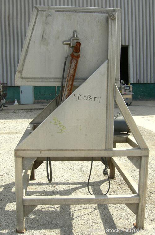 Used Box Dumper, 304 Stainless Steel. Dump area 54 1/2" wide x 39" deep x 28" high. Dual ram, hydraulically driven by a 2 hp, 3/60/208-230/460 volt, 1160 rpm motor. Approximate 60" dump height. Mount...