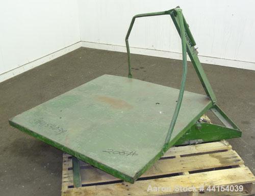 Used Gaylord Tilter, Carbon Steel. Approximate 44" long x 44" wide platform, air operated tilt. Mounted on a frame.