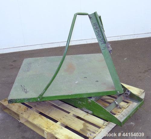Used Gaylord Tilter, Carbon Steel. Approximate 44" long x 44" wide platform, air operated tilt. Mounted on a frame.