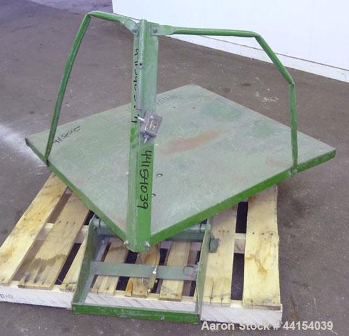 Used Gaylord Tilter, Carbon Steel. Approximate 44" long x 44" wide platform, air operated tilt. Mounted on a frame.