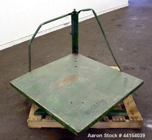 Used Gaylord Tilter, Carbon Steel. Approximate 44" long x 44" wide platform, air operated tilt. Mounted on a frame.