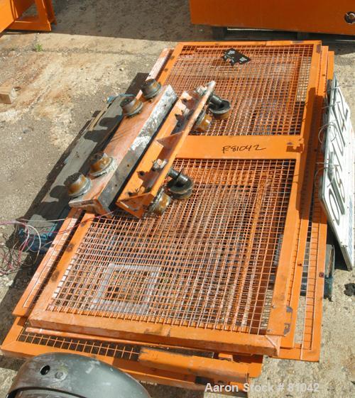 USED: Tubar tote dumper, model TDHD. Approximately 28" wide x 28" long x 39" high totes x 3000 pound capacity. Top feed/disc...