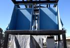 Used Dumpers Unlimited Dual Station Hydraulic Gondola Dumper. (2) Cradles approximate 44