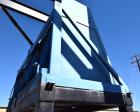 Used Dumpers Unlimited Dual Station Hydraulic Gondola Dumper. (2) Cradles approximate 44
