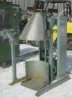 Used Hercules Industries Low Level Hydraulic Drum Dumper. Approximately 750 pound capacity, carbon steel frame, stainless steel discharge chute with 8