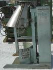 Used Hercules Industries Low Level Hydraulic Drum Dumper. Approximately 750 pound capacity, carbon steel frame, stainless steel discharge chute with 8