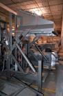 Used Meyer Machine Box Unloader, Model HBU-1500-SH, Carbon Steel Frame. 1500 Pound capacity. Approximate 44” x 44” bottom box plate, stainless steel discharge hood with an air operated slide valve. I...