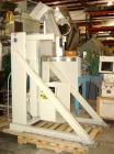 Used NBE Lift and Seal Drum Dumper, Stainless Steel Material Contact Parts, Model 19-700.  750 pound capacity unit. Comes complete with controls and power disconnect interface. Material flow is contr...