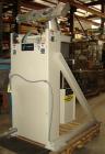 Used NBE Lift and Seal Drum Dumper, Stainless Steel Material Contact Parts, Model 19-700.  750 pound capacity unit. Comes complete with controls and power disconnect interface. Material flow is contr...