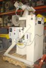 Used NBE Lift and Seal Drum Dumper, Stainless Steel Material Contact Parts, Model 19-700.  750 pound capacity unit. Comes complete with controls and power disconnect interface. Material flow is contr...