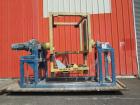 Used Tote Systems tote tumbler, designed for a 48