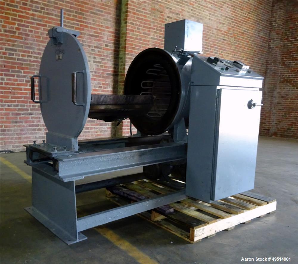 Used Beringer Jet Cleaner, Model 1724. Approximately 17" diameter x 24" long carbon steel chamber. Roll out parts tray approximate 23-1/2'' long. Maximum operating temperature 950 degrees F. Includes...