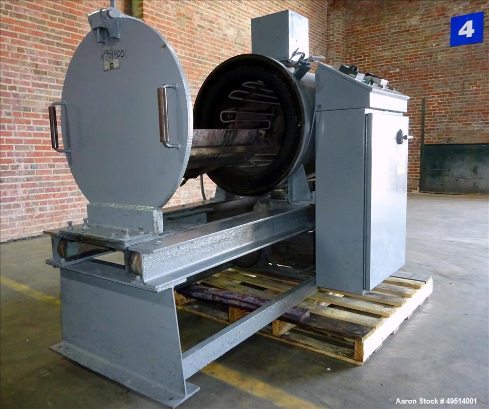 Used Beringer Jet Cleaner, Model 1724. Approximately 17" diameter x 24" long carbon steel chamber. Roll out parts tray approximate 23-1/2'' long. Maximum operating temperature 950 degrees F. Includes...