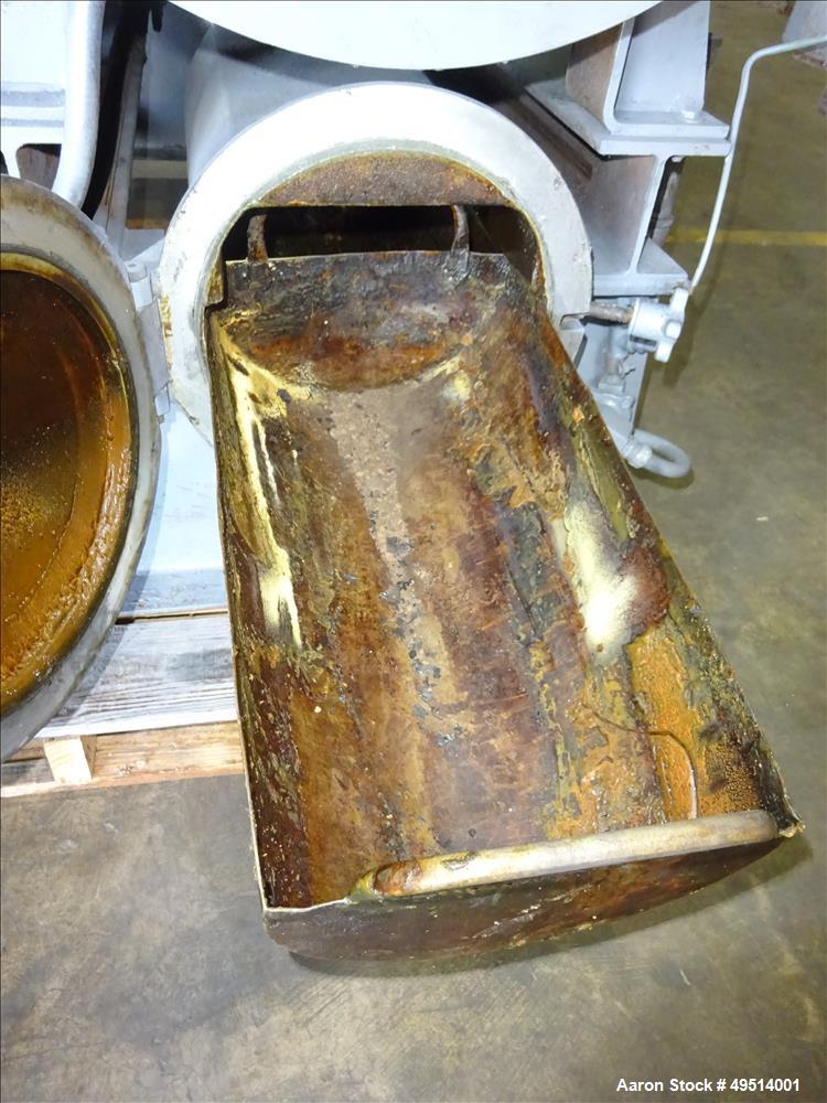 Used Beringer Jet Cleaner, Model 1724. Approximately 17" diameter x 24" long carbon steel chamber. Roll out parts tray approximate 23-1/2'' long. Maximum operating temperature 950 degrees F. Includes...