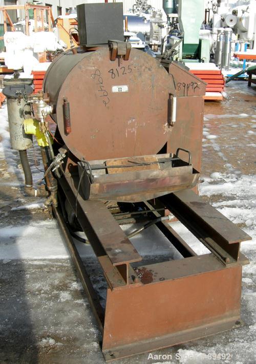 USED: Beringer jet cleaner, model 1724, horizontal arrangement. 20" diameter x 27" deep working chamber, quick clamp cover. Unit includes cleaning tray and control panel. Mounted on a frame.