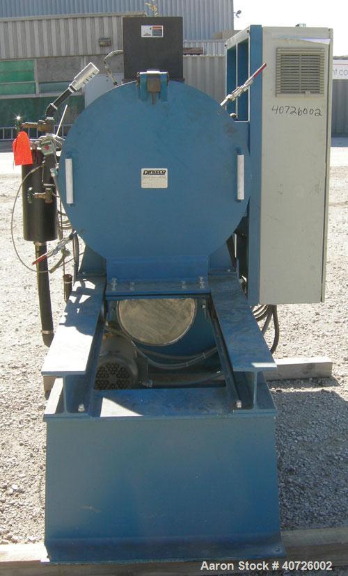 Used Dynisco Jet Cleaner, Model JC1724E. Approximately 20" diameter x 27" long 304 stainless steel chamber. Roll out parts tray 23 1/2" long. Maximum operating temperature 950 deg F. Includes a Tuthi...