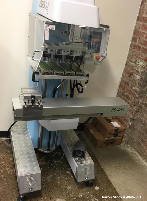 Used Tosh Logica Pad Printer, Model L-02-4C. Four color, (4) 70mm diameter mag ink cups, (4) 70 mm CR blades, (4) 100 x 250 x 10 mm cliche supports, (4) XY axis adjustable pad holders, foot pedal, ad...