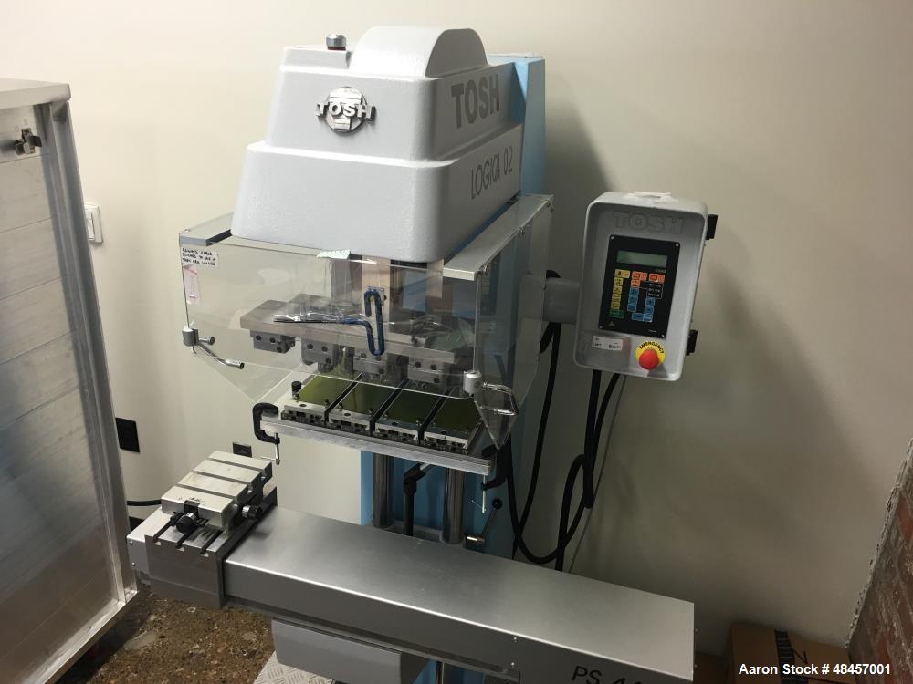 Used Tosh Logica Pad Printer, Model L-02-4C. Four color, (4) 70mm diameter mag ink cups, (4) 70 mm CR blades, (4) 100 x 250 x 10 mm cliche supports, (4) XY axis adjustable pad holders, foot pedal, ad...
