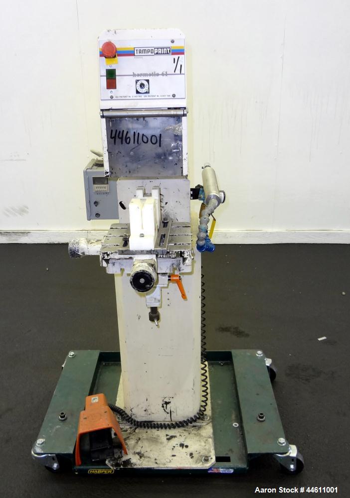 Used Tampo Print Pad Printer, Model Hermetic 61. Single cycle, approximately 1300-1400 per hour. Ink doctoring cup 60 mm, cliché size 70 mm x 140 mm, maximum print image size 55 mm. Includes foot ped...