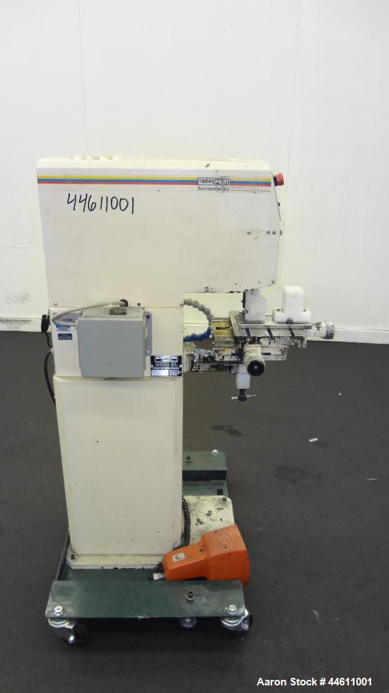 Used Tampo Print Pad Printer, Model Hermetic 61. Single cycle, approximately 1300-1400 per hour. Ink doctoring cup 60 mm, cliché size 70 mm x 140 mm, maximum print image size 55 mm. Includes foot ped...
