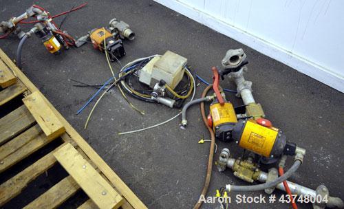 Used PIAB Vacuum Conveyor, Model VCP800, 316 Stainless Steel. Housing approximately 22" diameter x 38" long, rated 150 pounds per minute. Includes miscellaneous parts and valves.
