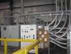 Used Main Silo weight control system consisting of: Hopper, Mettler Toledo model partner plus digital read-out controller, roller top conveyor, KM model system 2020 controller system, Nucon system, b...