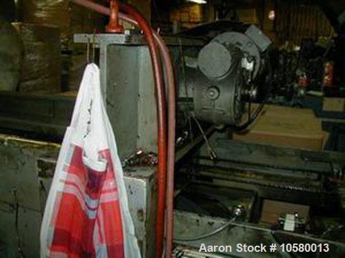 Used-23" Plastimac/DeBernardi model 602 T-shirt bag machine. Manufactured 1989.