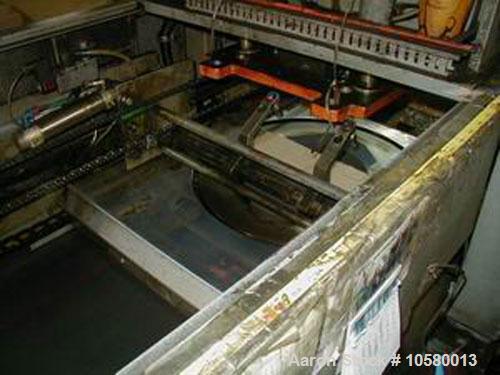 Used 23" Plastimac/DeBernardi model 602 T-shirt bag machine. Manufactured 1989.