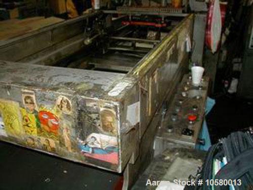 Used 23" Plastimac/DeBernardi model 602 T-shirt bag machine. Manufactured 1989.