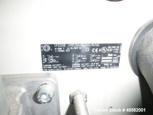 Used Delta On the Fly Leak Tester, Model UDK 350. One head, specifically designed for the testing of plastic empty bottles. on the fly" movement, bottles are never stopped (no accumulation). No bottl...