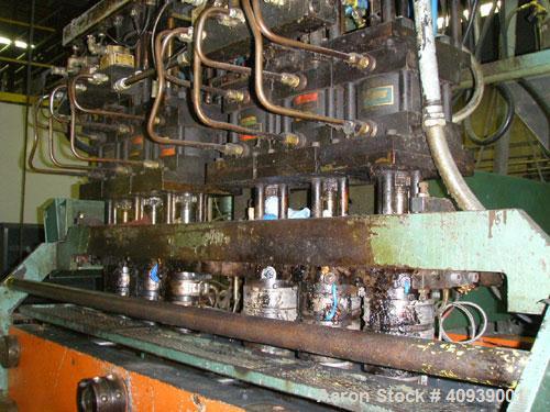 Used Uniloy Model 350R3 6 Head Blow Molder, new 1988. 6 heads are set on 8" centers, has Maaco 8000 programmable control and includes 6 tie bar platen with (2) sections each with 28.5" wide X 16" top...