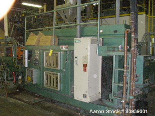 Used Uniloy Model 350R3 6 Head Blow Molder, new 1988. 6 heads are set on 8" centers, has Maaco 8000 programmable control and includes 6 tie bar platen with (2) sections each with 28.5" wide X 16" top...
