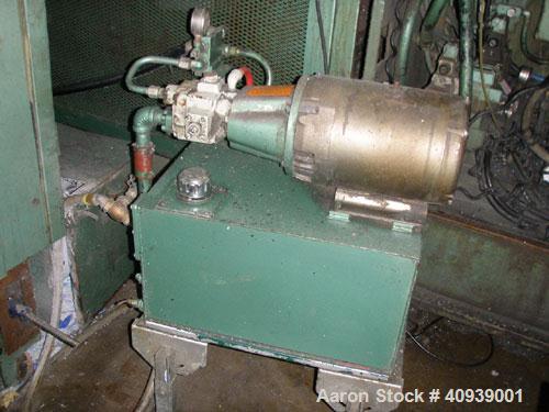 Used Uniloy Model 350R3 6 Head Blow Molder, new 1988. 6 heads are set on 8" centers, has Maaco 8000 programmable control and includes 6 tie bar platen with (2) sections each with 28.5" wide X 16" top...