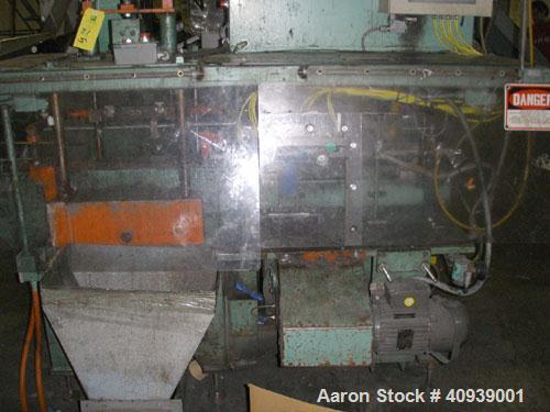 Used Uniloy Model 350R3 6 Head Blow Molder, new 1988. 6 heads are set on 8" centers, has Maaco 8000 programmable control and includes 6 tie bar platen with (2) sections each with 28.5" wide X 16" top...
