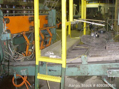 Used Uniloy Model 350R3 6 Head Blow Molder, new 1988. 6 heads are set on 8" centers, has Maaco 8000 programmable control and includes 6 tie bar platen with (2) sections each with 28.5" wide X 16" top...