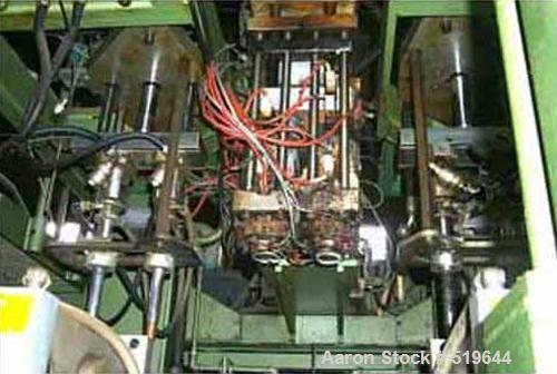USED: Fischer blow molder, model VK1-6D. Dual heads, double sided,dual parison (150mm centers), 4 cavity, approx range 4 oz to 2 gallon,80mm diameter screw. Complete with reflashing, parison and extr...
