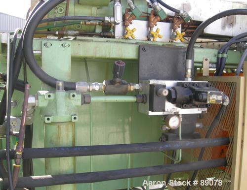 Used Hayssen Econoblow Blow Molding Machine, Model 5030-AS-375. Approximate 280 gram shot. 2" extruder, 24:1 L/D, 30 hp motor. 22-1/4" x 22-1/4" platens, effective platen size 16" x 21", 20 ton clamp...