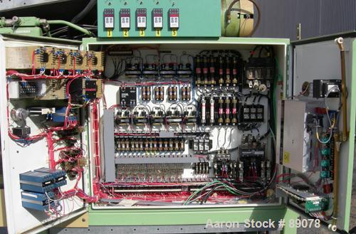 Used Hayssen Econoblow Blow Molding Machine, Model 5030-AS-375. Approximate 280 gram shot. 2" extruder, 24:1 L/D, 30 hp motor. 22-1/4" x 22-1/4" platens, effective platen size 16" x 21", 20 ton clamp...